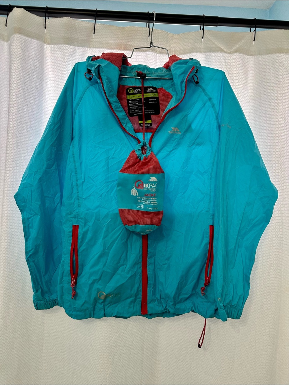 Qikpac Turquoise blue waterproof jacket  size XS